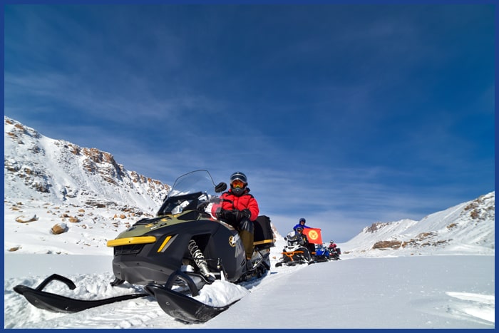 Snowmobile tours, Kyrgyzstan tours, Winter tours.